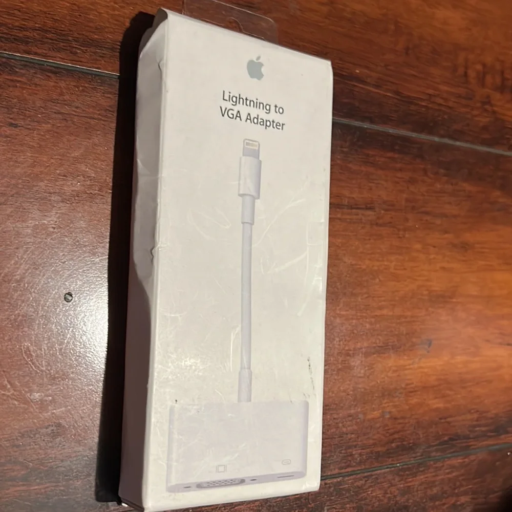 The lightening to VGA Adapter by Apple!